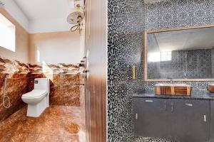 Ένα μπάνιο στο Hotel O Turahalli