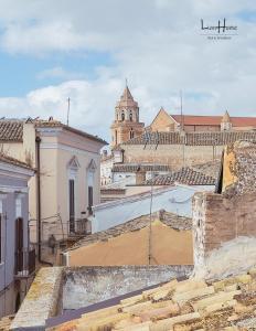 a view of a city from the roof of a building at LianHome b&b "Terrazzino" in Lucera