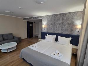 Postel nebo postele na pokoji v ubytování Park Hotel Viasport + 58 fotografií