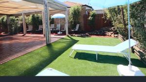 Κήπος έξω από το Canberra Stylish Retreat