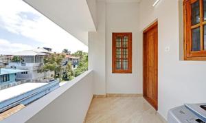 a view from the balcony of a house at PALM GROVE By D2V in Cochin