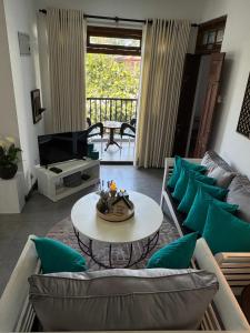 Et opholdsområde på Cinnamon Apartments Panadura + 15 billeder