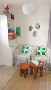 a living room with a coffee table and a couch at cocon des arènes et parking in Nîmes