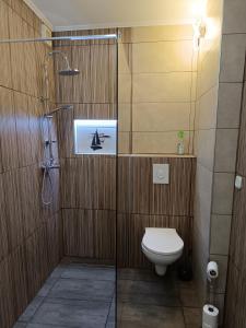 Ένα μπάνιο στο Lugas Apartman +68 φωτογραφίες