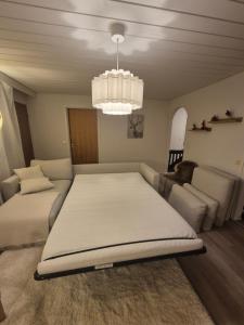 Postel nebo postele na pokoji v ubytování Cozy Home at Rovaniemi