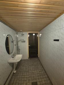 Koupelna v ubytování Cozy Home at Rovaniemi + 19 fotografií