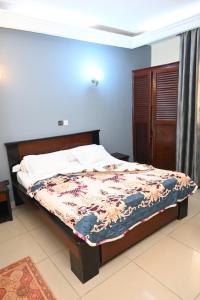 Ένα ή περισσότερα κρεβάτια σε δωμάτιο στο Hôtel Santa Lucia