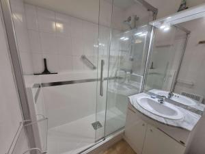 a bathroom with a shower and a sink at Confortable appartement 4 personnes avec balcon, parking à Stella Plage - FR-1-236-173 in Stella-Plage