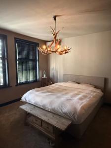 En eller flere senge i et værelse på Luxury apartment top location