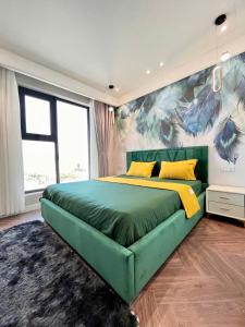 En eller flere senge i et værelse på Quy Nhon Altara cosy apartment + 98 billeder