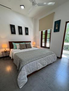 En eller flere senge i et værelse på Cinnamon apartment