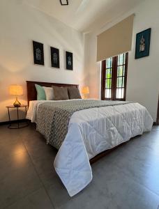 En eller flere senge i et værelse på Cinnamon apartment + 12 billeder