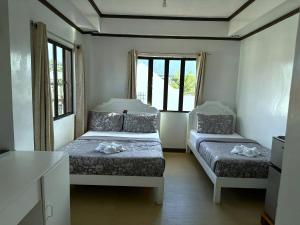 Postel nebo postele na pokoji v ubytování Florabells Guest House - Batanes + 82 fotografií