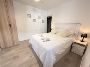 Ένα ή περισσότερα κρεβάτια σε δωμάτιο στο Casa Sirena