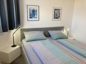 Postel nebo postele na pokoji v ubytování Meerblick zur Nordsee 250 Meter z. Strand