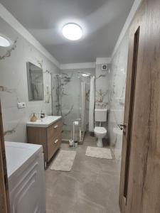 Koupelna v ubytování XTN house AIRPORT + 18 fotografií