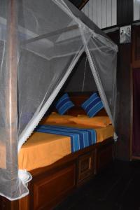 Кровать или кровати в номере Diamond Villa Weligama Bay +4 фотографии