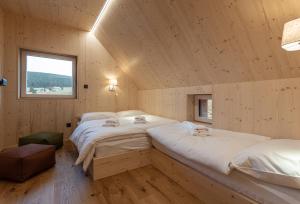 Postel nebo postele na pokoji v ubytování Chata Na Vyhlídce + 33 fotografií