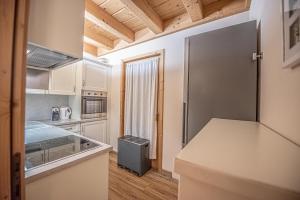 Kuchyň nebo kuchyňský kout v ubytování Chalet Larice