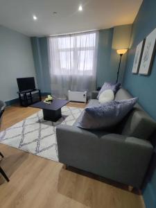 Et opholdsområde på Modern New Build 2 Beds, Sofa Bed, Parking