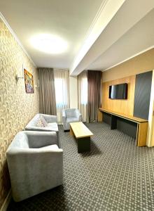 Posezení v ubytování Golden Palace Hotel