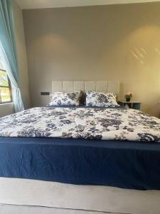 Ένα ή περισσότερα κρεβάτια σε δωμάτιο στο Mini Hotel OL