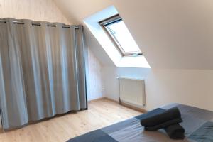 Postel nebo postele na pokoji v ubytování Appartement chaleureux - 20 min de Strasbourg