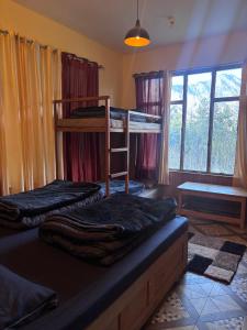 Kuchyň nebo kuchyňský kout v ubytování Oreos cafe and stay shangarh