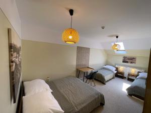 Ένα ή περισσότερα κρεβάτια σε δωμάτιο στο Teka Guesthouse