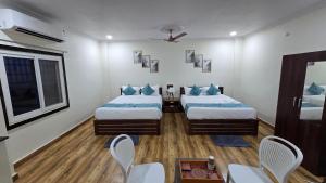 Ένα ή περισσότερα κρεβάτια σε δωμάτιο στο RB Resorts +15 φωτογραφίες