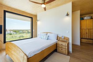 En eller flere senge i et værelse på Victoria Atlantica