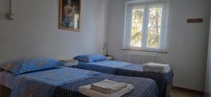 Ένα ή περισσότερα κρεβάτια σε δωμάτιο στο Casa Elia