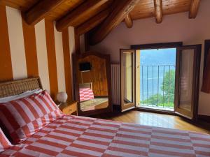 Ένα ή περισσότερα κρεβάτια σε δωμάτιο στο Casa Vacanza Castagna