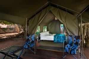 Postel nebo postele na pokoji v ubytování Nkula Camp - Pafuri Walking Safari's