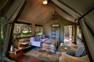 Postel nebo postele na pokoji v ubytování Hutwini Camp - Pafuri Walking Safaris + 38 fotografií