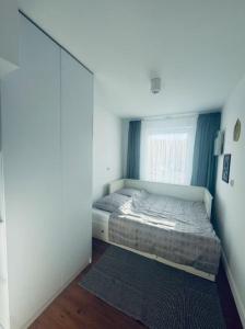 Postel nebo postele na pokoji v ubytování MD Neptun