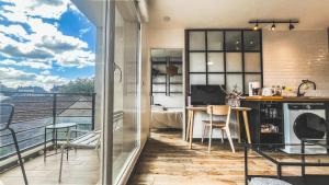 Χώρος καθιστικού στο Au Petit Vélo - Parking & Balcon Vienne