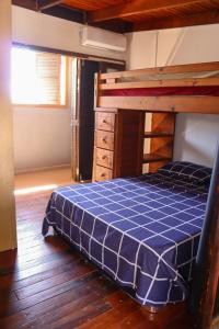 a bedroom with a bunk bed with a blue mattress at Sobrado São Chico, Ubatuba SFS in São Francisco do Sul +23 photos