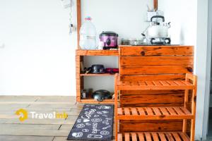 Kuchyň nebo kuchyňský kout v ubytování Dieng Hills Cabin