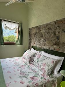 Ένα ή περισσότερα κρεβάτια σε δωμάτιο στο Castagna Holiday Home