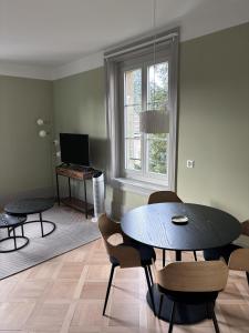 TV a/nebo společenská místnost v ubytování Union Lodge Berna