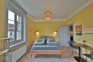 Postel nebo postele na pokoji v ubytování Union Lodge Berna