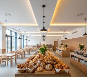 a bakery with a bunch of breads on display at Görgülü Apart 06 in Mamak