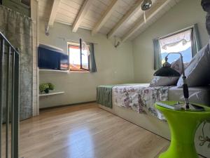 Μια τηλεόραση ή/και κέντρο ψυχαγωγίας στο Castagna Holiday Home