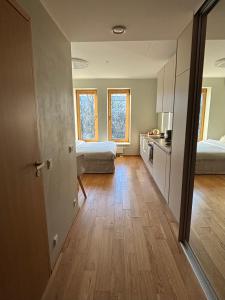 Postel nebo postele na pokoji v ubytování The Pakview Studio Apartment