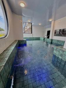 Hồ bơi trong/gần Hotel Estrela do Mar