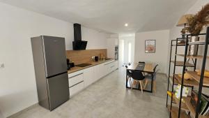 Η κουζίνα ή μικρή κουζίνα στο Maison 2 chambres, 6 couchages