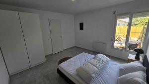 Ένα ή περισσότερα κρεβάτια σε δωμάτιο στο Maison 2 chambres, 6 couchages +10 φωτογραφίες