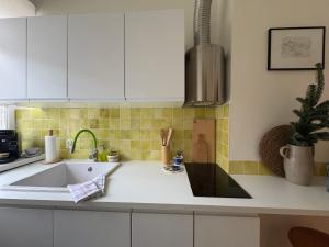 Η κουζίνα ή μικρή κουζίνα στο Apartament przy księgarni