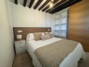 Ένα ή περισσότερα κρεβάτια σε δωμάτιο στο Casa Cuartel